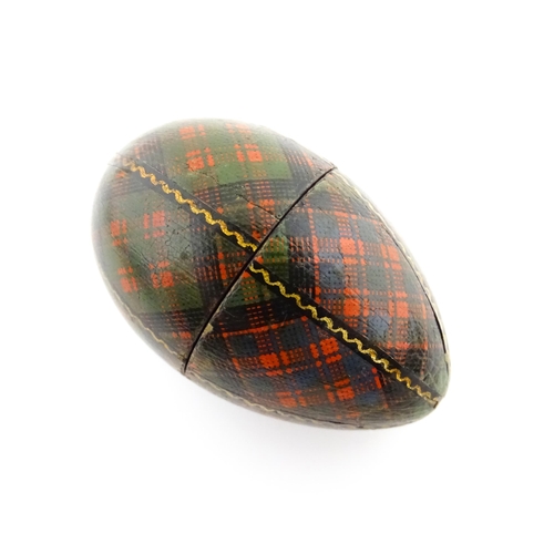 1154 - A 19thC Tartan ware sewing thimble case of egg form, titled McDonald. Approx. 2