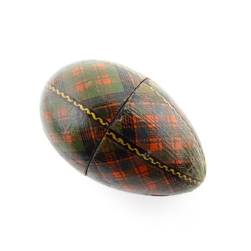 1154 - A 19thC Tartan ware sewing thimble case of egg form, titled McDonald. Approx. 2