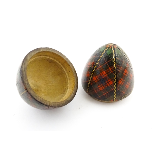 1154 - A 19thC Tartan ware sewing thimble case of egg form, titled McDonald. Approx. 2