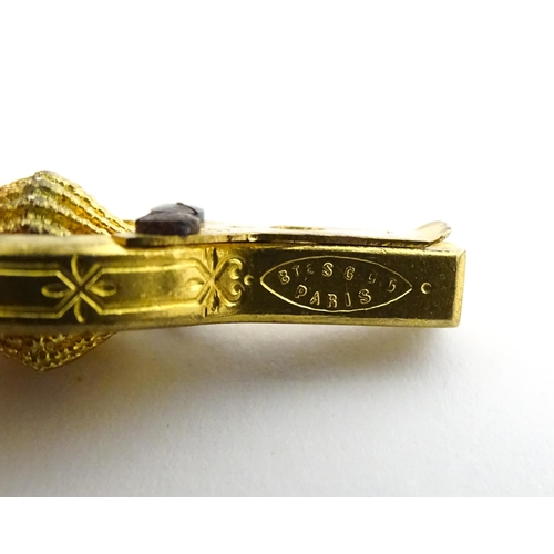 1157 - Sewing Interest: A late 19th / early 20thC French gilt metal needle threader. Marked Bte SGDG Paris.... 