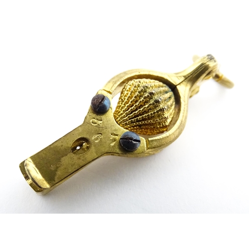 1157 - Sewing Interest: A late 19th / early 20thC French gilt metal needle threader. Marked Bte SGDG Paris.... 