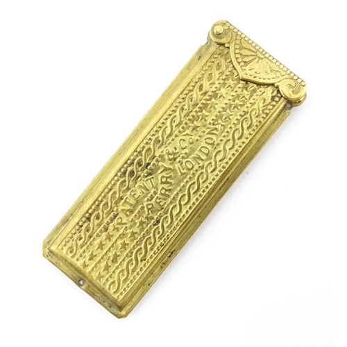 1158 - A Victorian Perry & Co. gilt metal pencil lead case of rectangular form, marked to lid Solid Ink. Ap... 