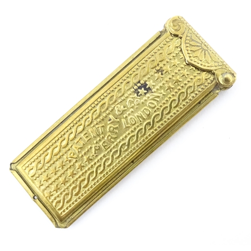 1158 - A Victorian Perry & Co. gilt metal pencil lead case of rectangular form, marked to lid Solid Ink. Ap... 