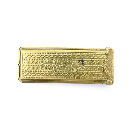 1158 - A Victorian Perry & Co. gilt metal pencil lead case of rectangular form, marked to lid Solid Ink. Ap... 