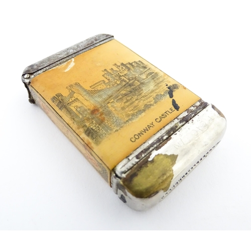 1170 - A 20thC Welsh vesta case decorated with a vignette depicting Conway / Conwy Castle to one side, the ... 