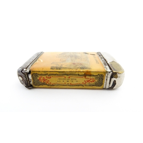 1170 - A 20thC Welsh vesta case decorated with a vignette depicting Conway / Conwy Castle to one side, the ... 