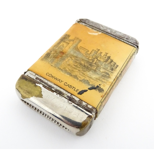 1170 - A 20thC Welsh vesta case decorated with a vignette depicting Conway / Conwy Castle to one side, the ... 