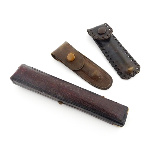 1171 - Three assorted early 20thC cheroot mouthpieces one with a Continental gold mount / ejector slide, an... 