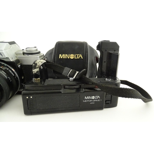 1179 - A Minolta XG-M camera and Minolta Drive 1 with Tamron Adaptall 2 1:25 28mm lens together with a Vivi... 