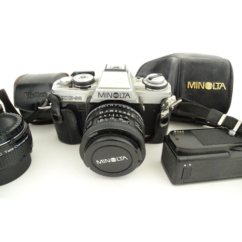 1179 - A Minolta XG-M camera and Minolta Drive 1 with Tamron Adaptall 2 1:25 28mm lens together with a Vivi... 