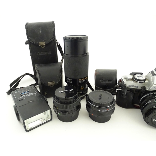 1179 - A Minolta XG-M camera and Minolta Drive 1 with Tamron Adaptall 2 1:25 28mm lens together with a Vivi... 