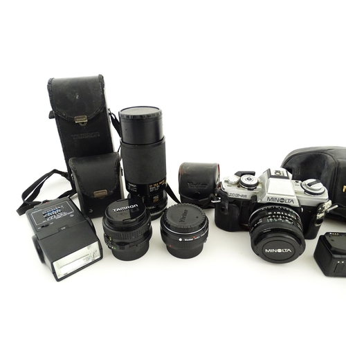 1179 - A Minolta XG-M camera and Minolta Drive 1 with Tamron Adaptall 2 1:25 28mm lens together with a Vivi... 