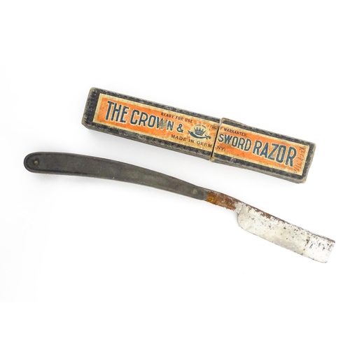 1183 - Four early 20thC razors to include The Crown & Sword Razor, The Encore Razor, Howe's Salop Razor, et... 