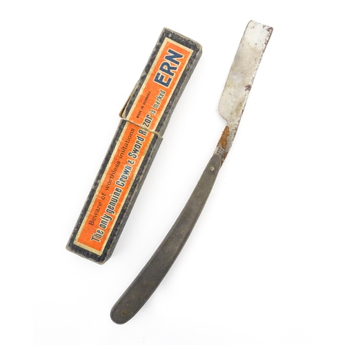 1183 - Four early 20thC razors to include The Crown & Sword Razor, The Encore Razor, Howe's Salop Razor, et... 