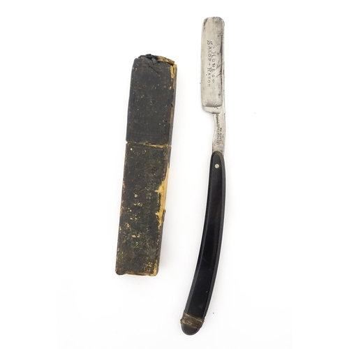 1183 - Four early 20thC razors to include The Crown & Sword Razor, The Encore Razor, Howe's Salop Razor, et... 