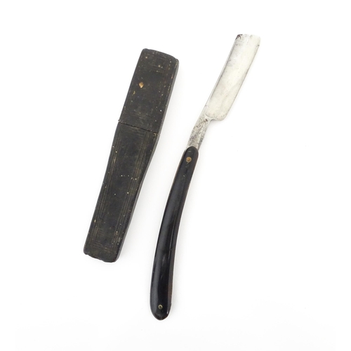 1183 - Four early 20thC razors to include The Crown & Sword Razor, The Encore Razor, Howe's Salop Razor, et... 