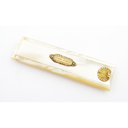 1197 - A 19thC French mother of pearl toothpick case with gilt shell detail to lid, containing a yellow met... 