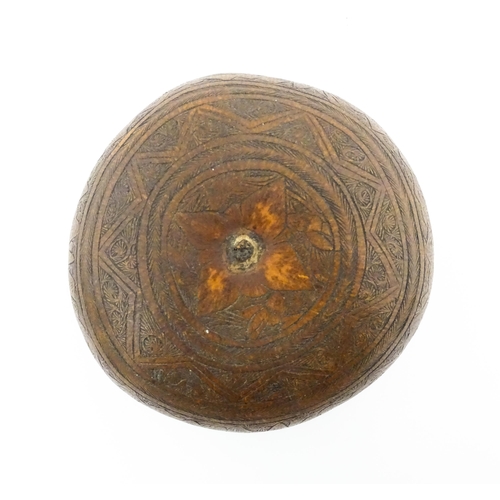 1198 - A late 19th / early 20thC gourd with naive engraved decoration depicting farmers working in the fiel... 