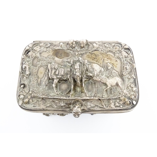 1205 - A 19thC Continental electroplate jewellery box decorated with figures and animals in landscapes, the... 