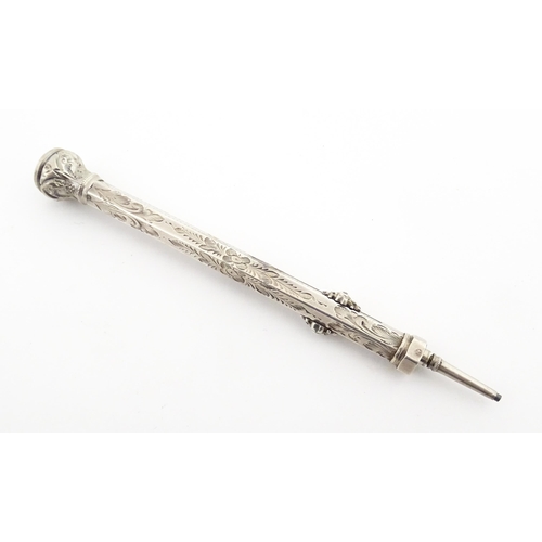 1211 - A Victorian silver combination pen and pencil with engraved decoration and seal top, hallmarked Birm... 