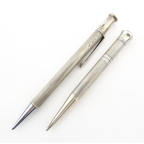 1213 - Two silver propelling pencils with engine turned decoration, one an Art Deco Mordan Everpoint hallma... 