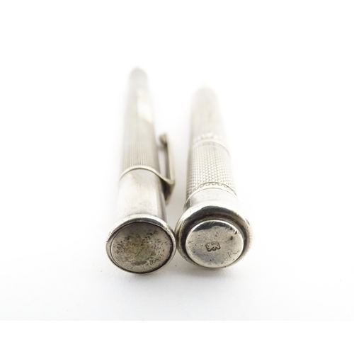 1213 - Two silver propelling pencils with engine turned decoration, one an Art Deco Mordan Everpoint hallma... 