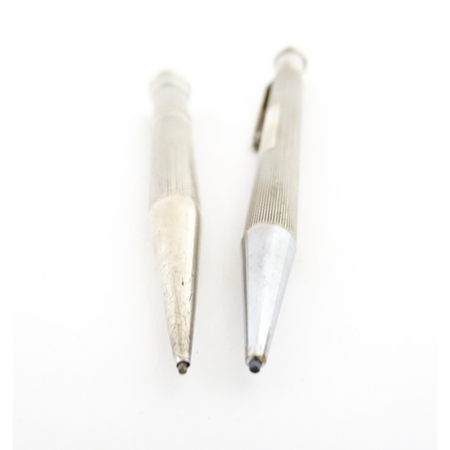 1213 - Two silver propelling pencils with engine turned decoration, one an Art Deco Mordan Everpoint hallma... 