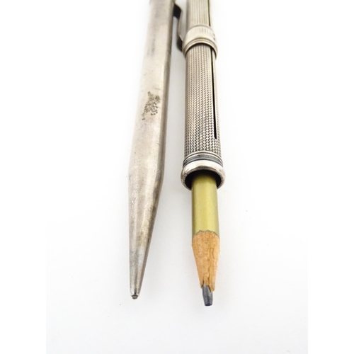 1216 - Two silver pencil by Sampson Mordan, the propelling pencil hallmarked London 1938, the pencil slide ... 