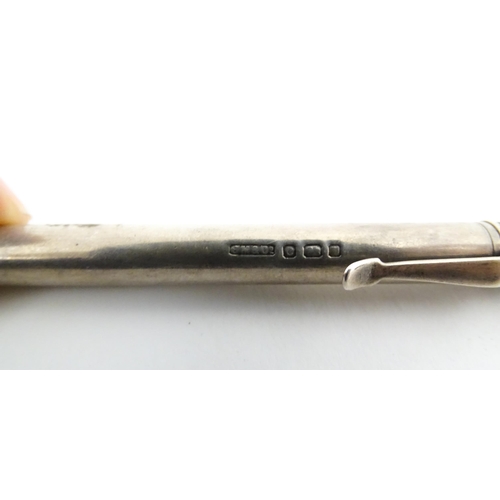 1216 - Two silver pencil by Sampson Mordan, the propelling pencil hallmarked London 1938, the pencil slide ... 