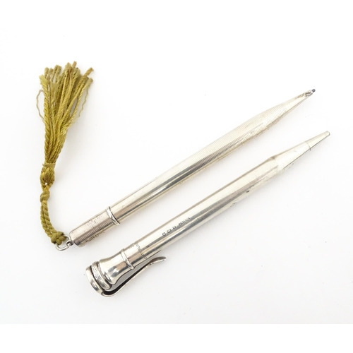 1217 - Two silver propelling pencils, comprising an Eversharp example hallmarked London 1936, the other hal... 