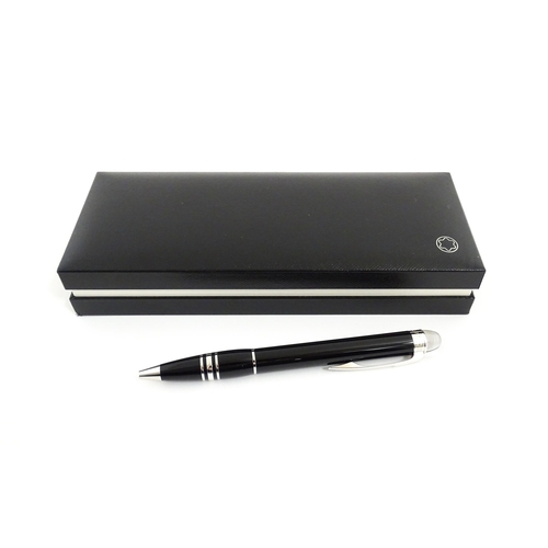 1221 - A cased Mont Blanc Starwalker ballpoint pen, together with a Mont Blanc Noblesse slimline barrel & c... 