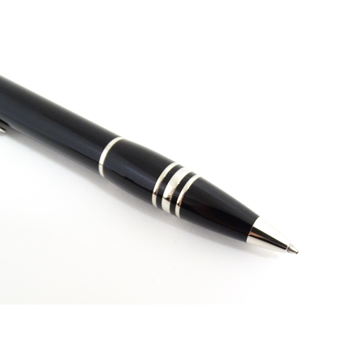 1221 - A cased Mont Blanc Starwalker ballpoint pen, together with a Mont Blanc Noblesse slimline barrel & c... 