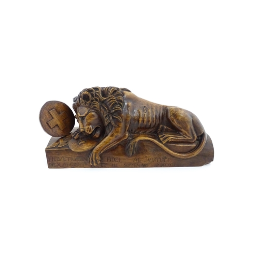 1226 - A late 19thC carved walnut model of the Lion of Lucerne after Bertel Thorvaldsen, inscribed Helvetio... 