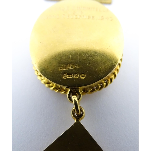 1227 - Masonic / Freemasonry Interest: A Scottish 15ct gold and gilt metal Masonic jewel, the central 15ct ... 