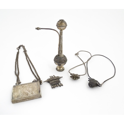 1241 - A quantity of white metal items to include pendants, purse, pipe etc. Pipe approx. 6 3/4