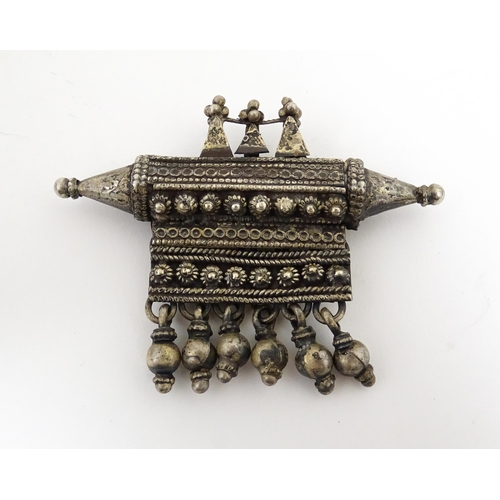 1241 - A quantity of white metal items to include pendants, purse, pipe etc. Pipe approx. 6 3/4