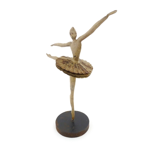 1262 - A 20thC cast model of a ballerina / dancer. Approx. 19 3/4