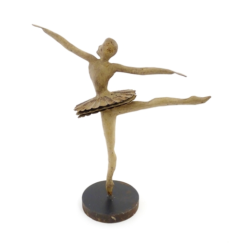 1262 - A 20thC cast model of a ballerina / dancer. Approx. 19 3/4