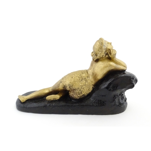 1266 - A 20thC composite model of a reclining nude, Femme sur Rocher after James Pradier. Approx. 10 1/4