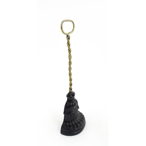 1271 - A Victorian Kenrick & Sons cast iron and brass door stop / door porter with loop handle and twist co... 