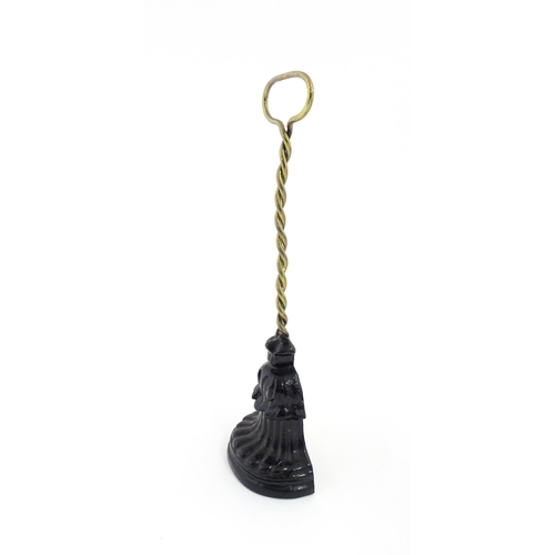 1271 - A Victorian Kenrick & Sons cast iron and brass door stop / door porter with loop handle and twist co... 