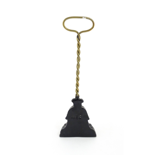 1271 - A Victorian Kenrick & Sons cast iron and brass door stop / door porter with loop handle and twist co... 