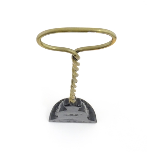 1271 - A Victorian Kenrick & Sons cast iron and brass door stop / door porter with loop handle and twist co... 