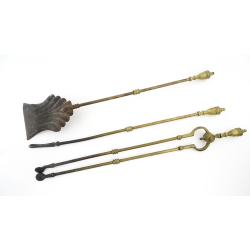 1277 - A late 19th / early 20thC brass fireside companion set, tools comprising shovel, tongs and poker. Ea... 