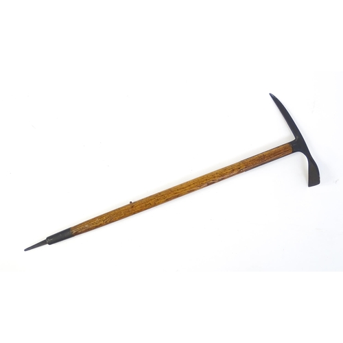 1278 - A 20thC Austrian mountaineering ice axe. Marked Original Aschenbrenner Ges Gesch. Approx. 33 1/4