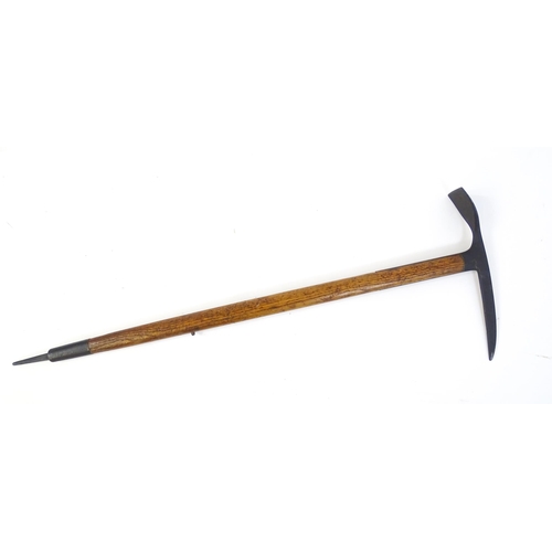 1278 - A 20thC Austrian mountaineering ice axe. Marked Original Aschenbrenner Ges Gesch. Approx. 33 1/4