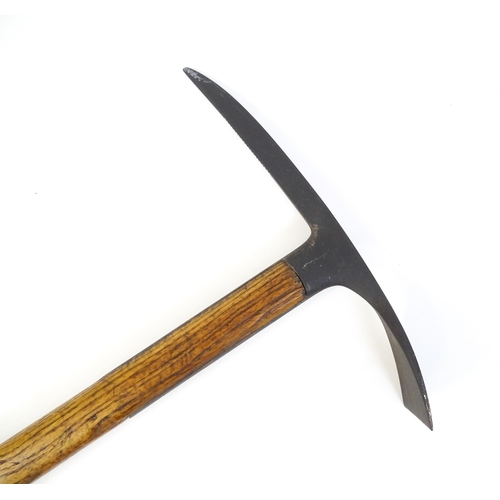 1278 - A 20thC Austrian mountaineering ice axe. Marked Original Aschenbrenner Ges Gesch. Approx. 33 1/4