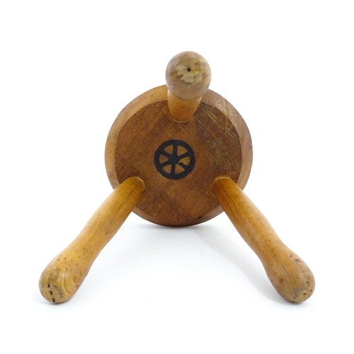 1285 - A 20thC fruitwood model of a milking stool. Approx. 6 1/4