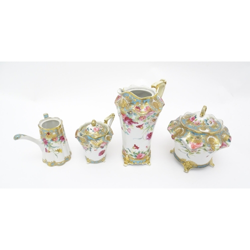 191 - Four Noritake wares decorated with flowers and foliage with gilt detail to include a chocolate pot, ... 