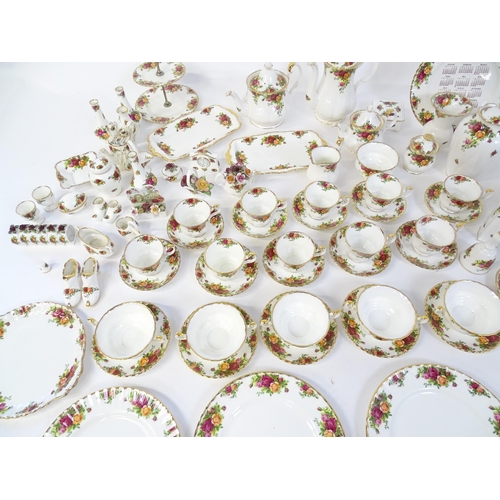 193 - A quantity of Royal Albert dinner and tea wares decorated in the Old Country Roses pattern to includ... 